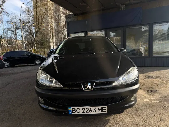 Peugeot 206 - фото 1