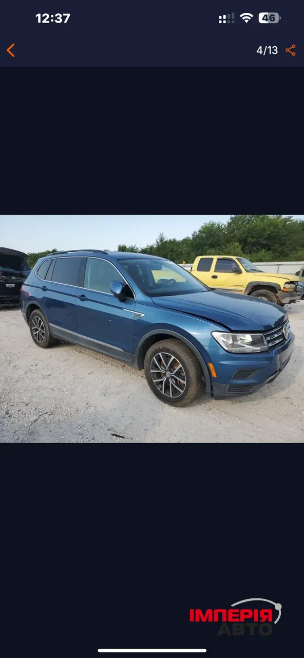 Volkswagen Tiguan - фото 4