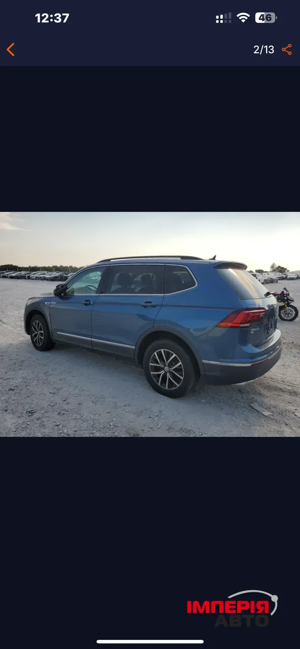 Volkswagen Tiguan - фото 2