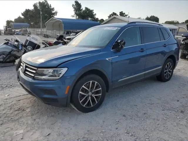 Volkswagen Tiguan - фото 1