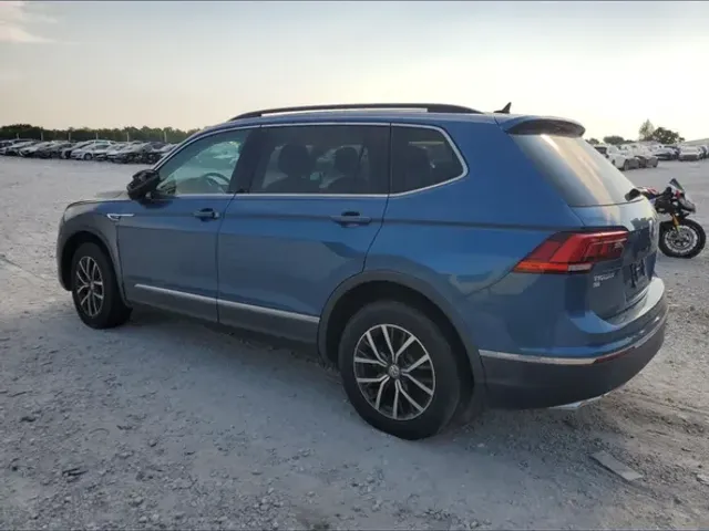 Volkswagen Tiguan - фото 2