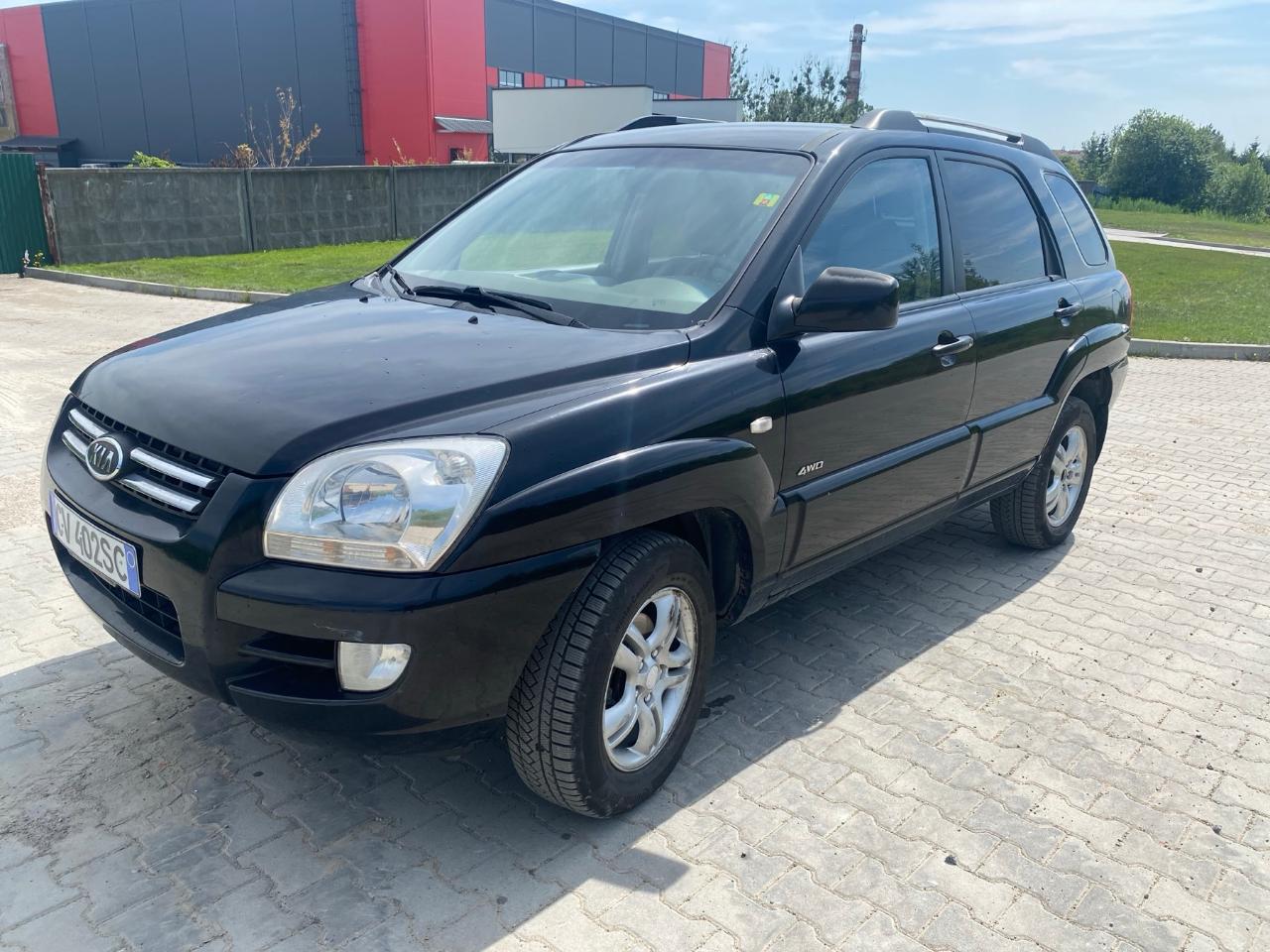 Kia Sportage - фото 1