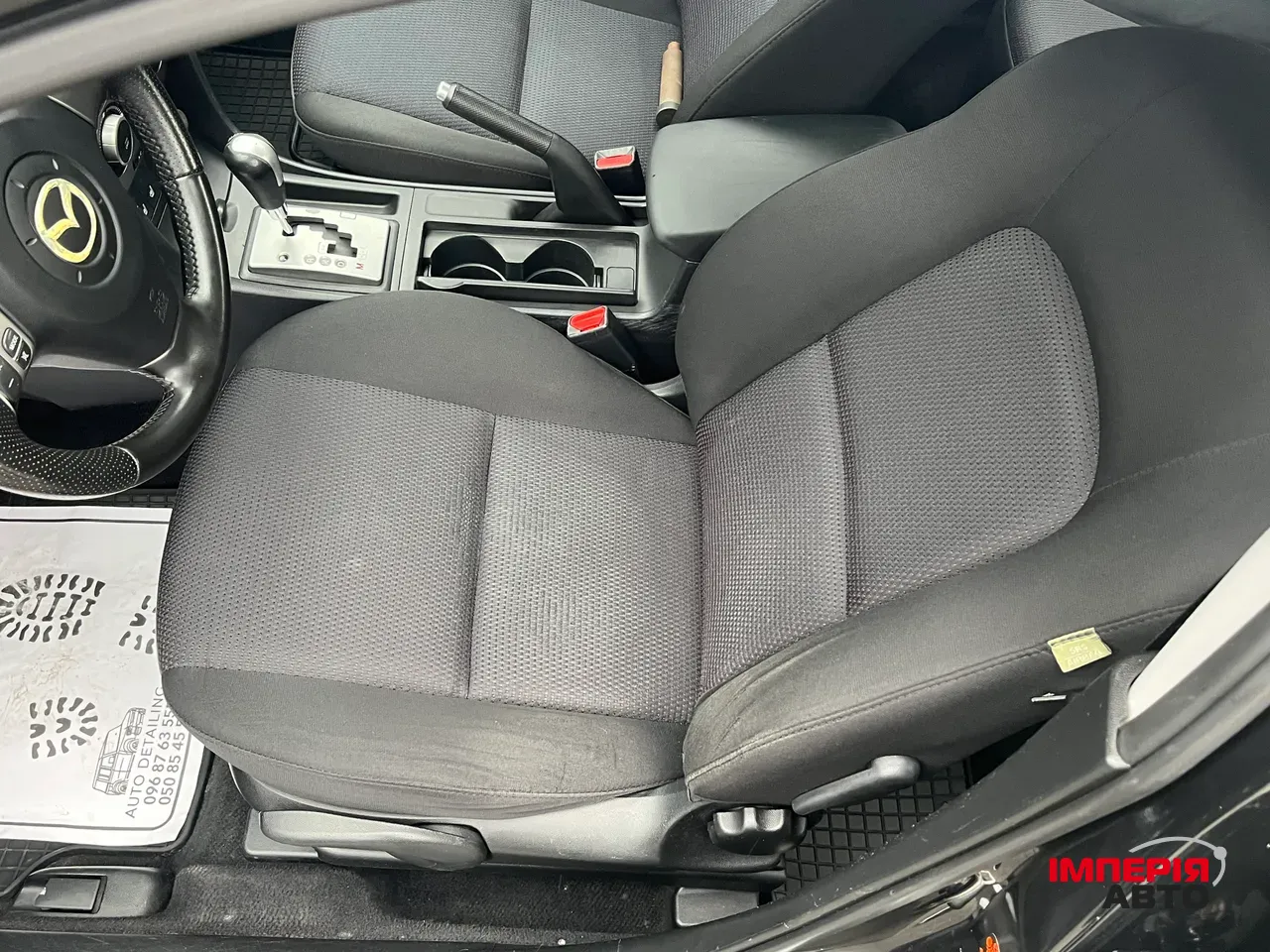 Mazda 3 - фото 24