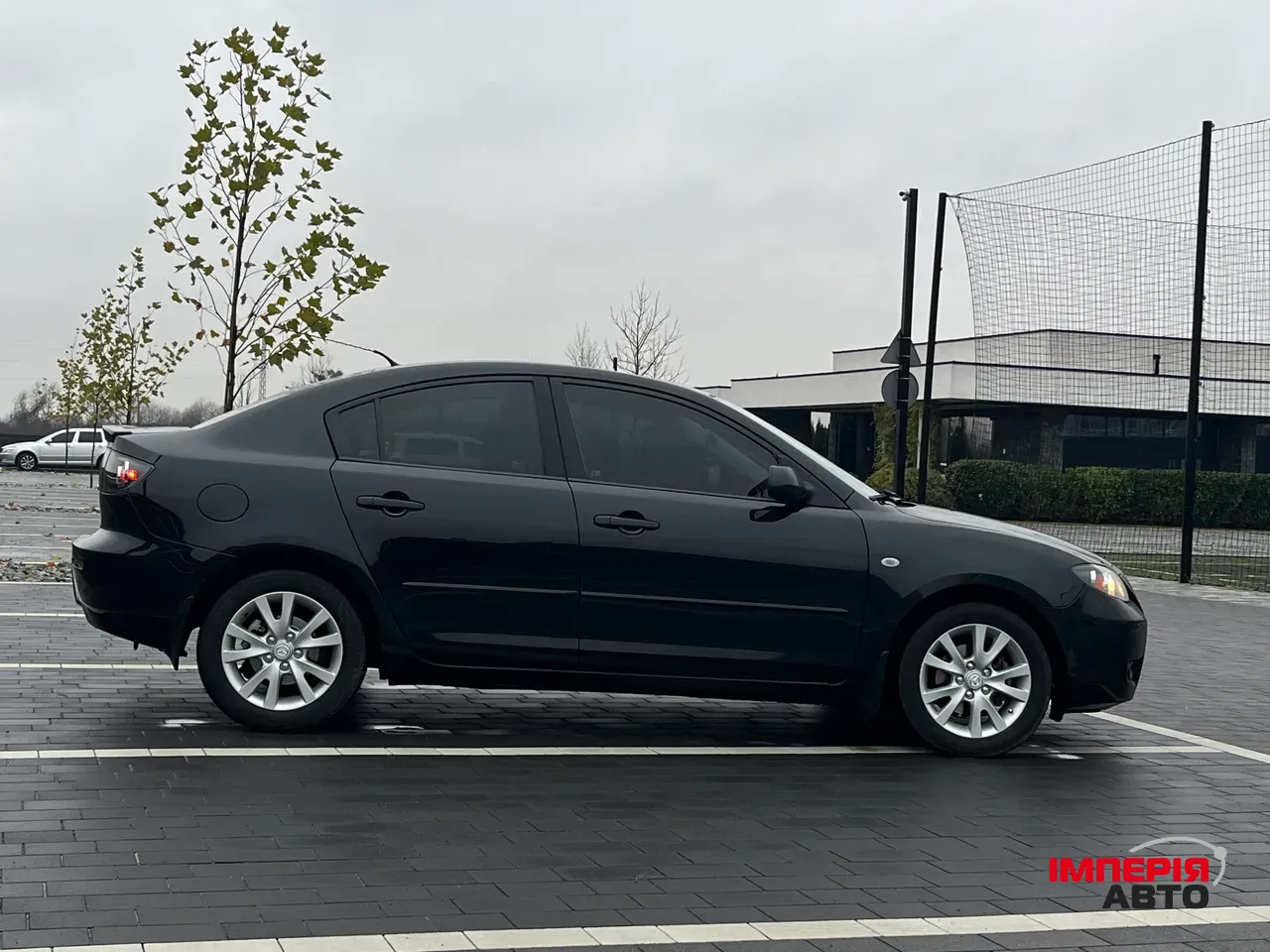 Mazda 3 - фото 11