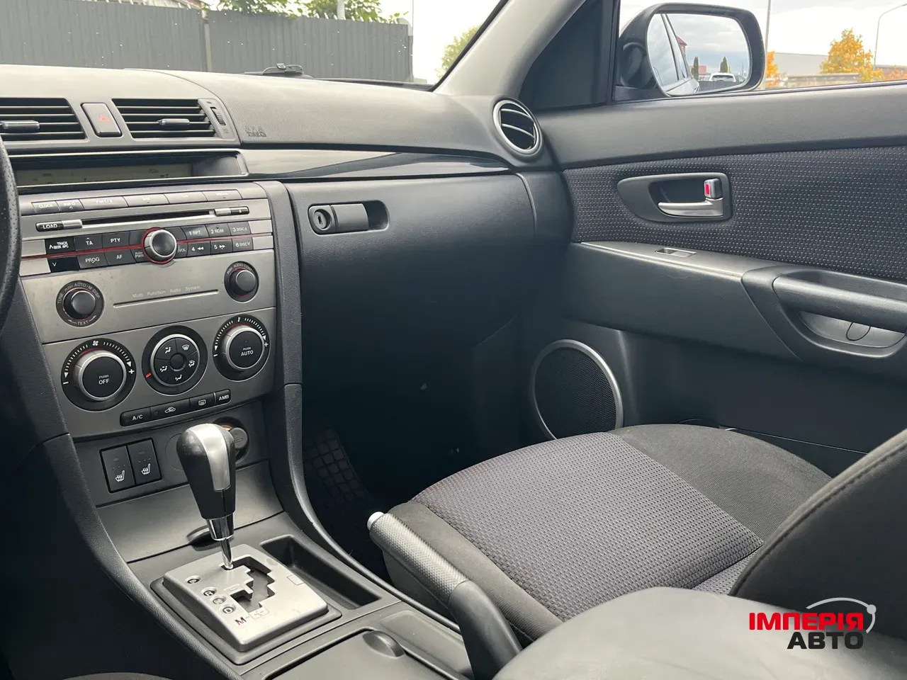 Mazda 3 - фото 32