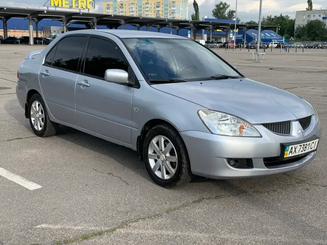 Mitsubishi Lancer - фото 1