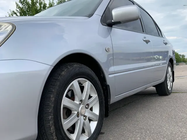 Mitsubishi Lancer - фото 3