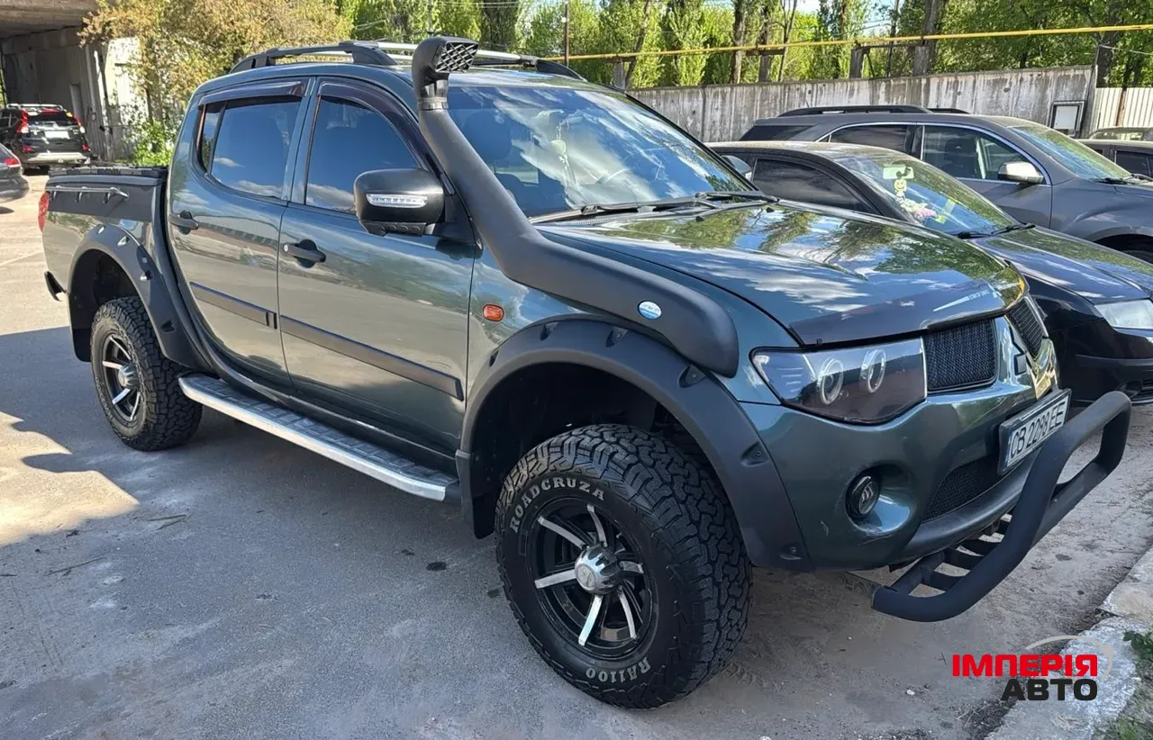 Mitsubishi L200 - фото 1