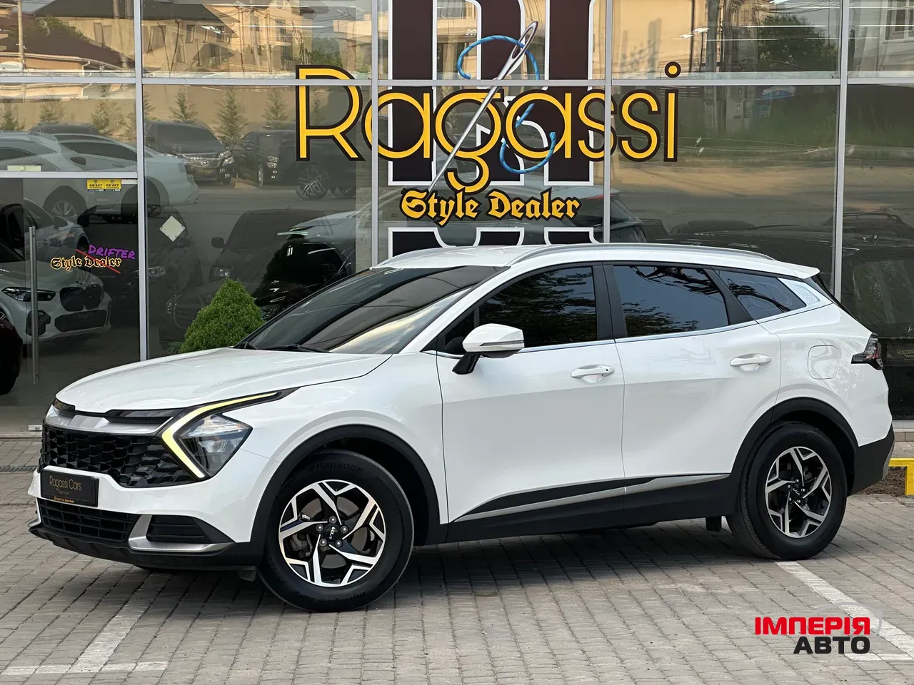 Kia Sportage - фото 1