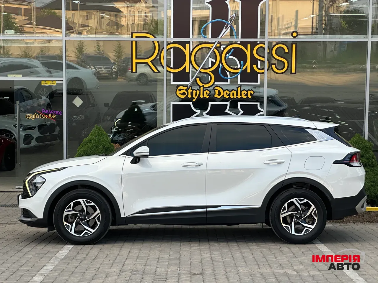 Kia Sportage - фото 9