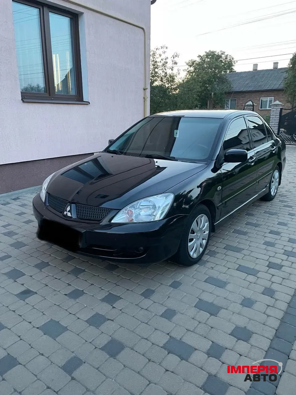 Mitsubishi Lancer - фото 2