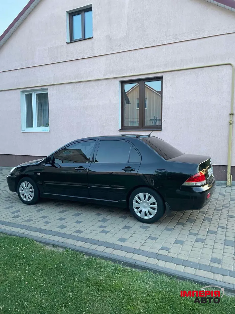 Mitsubishi Lancer - фото 5