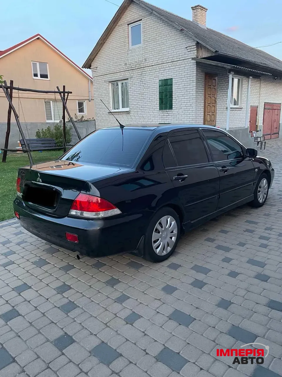 Mitsubishi Lancer - фото 3