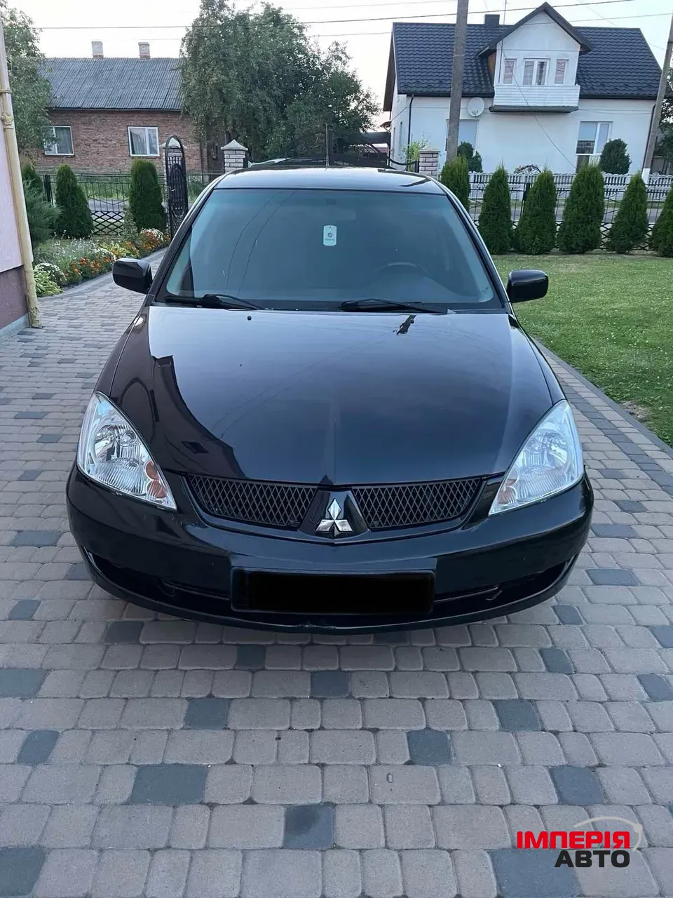 Mitsubishi Lancer - фото 1