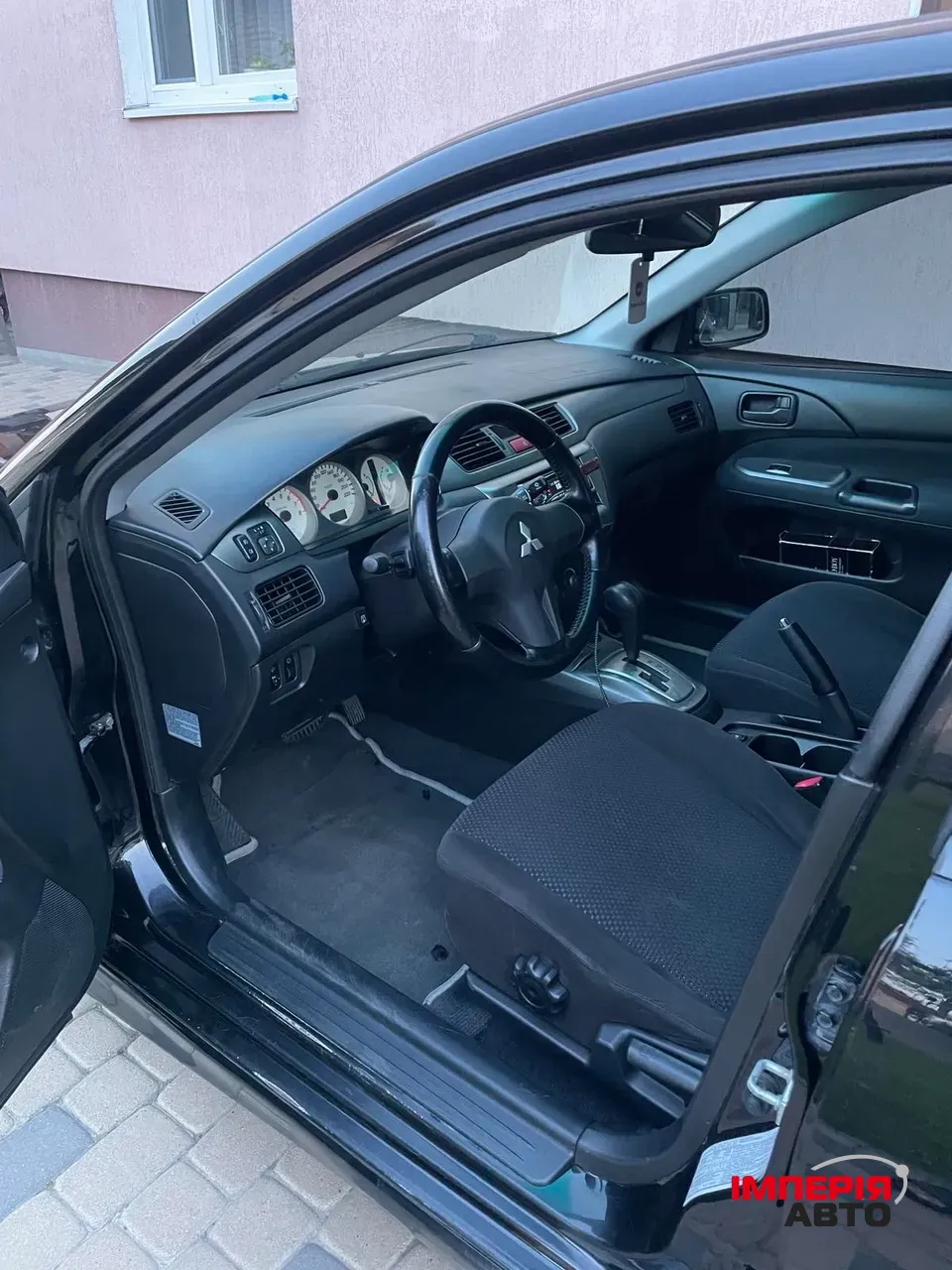 Mitsubishi Lancer - фото 6