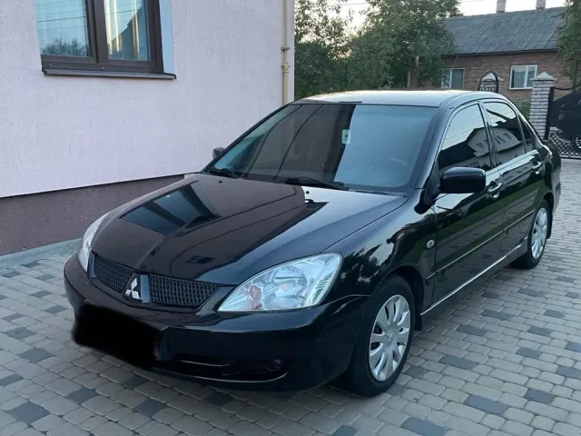Mitsubishi Lancer - фото 2