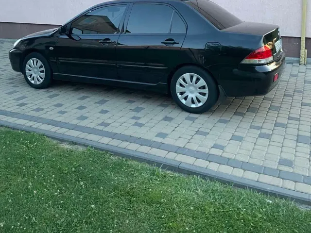 Mitsubishi Lancer - фото 5