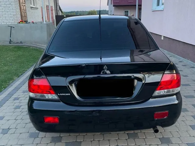 Mitsubishi Lancer - фото 4