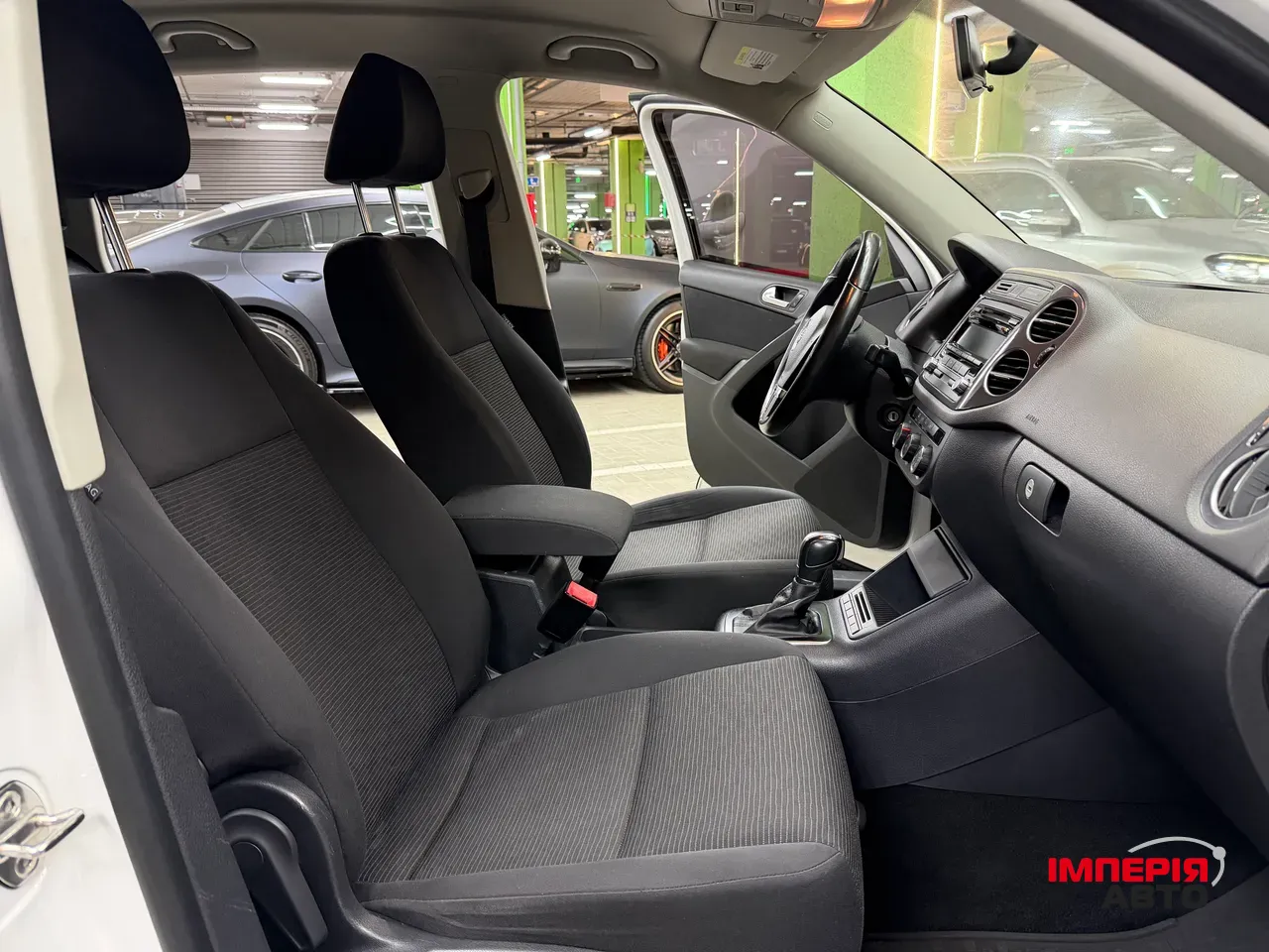 Volkswagen Tiguan - фото 11