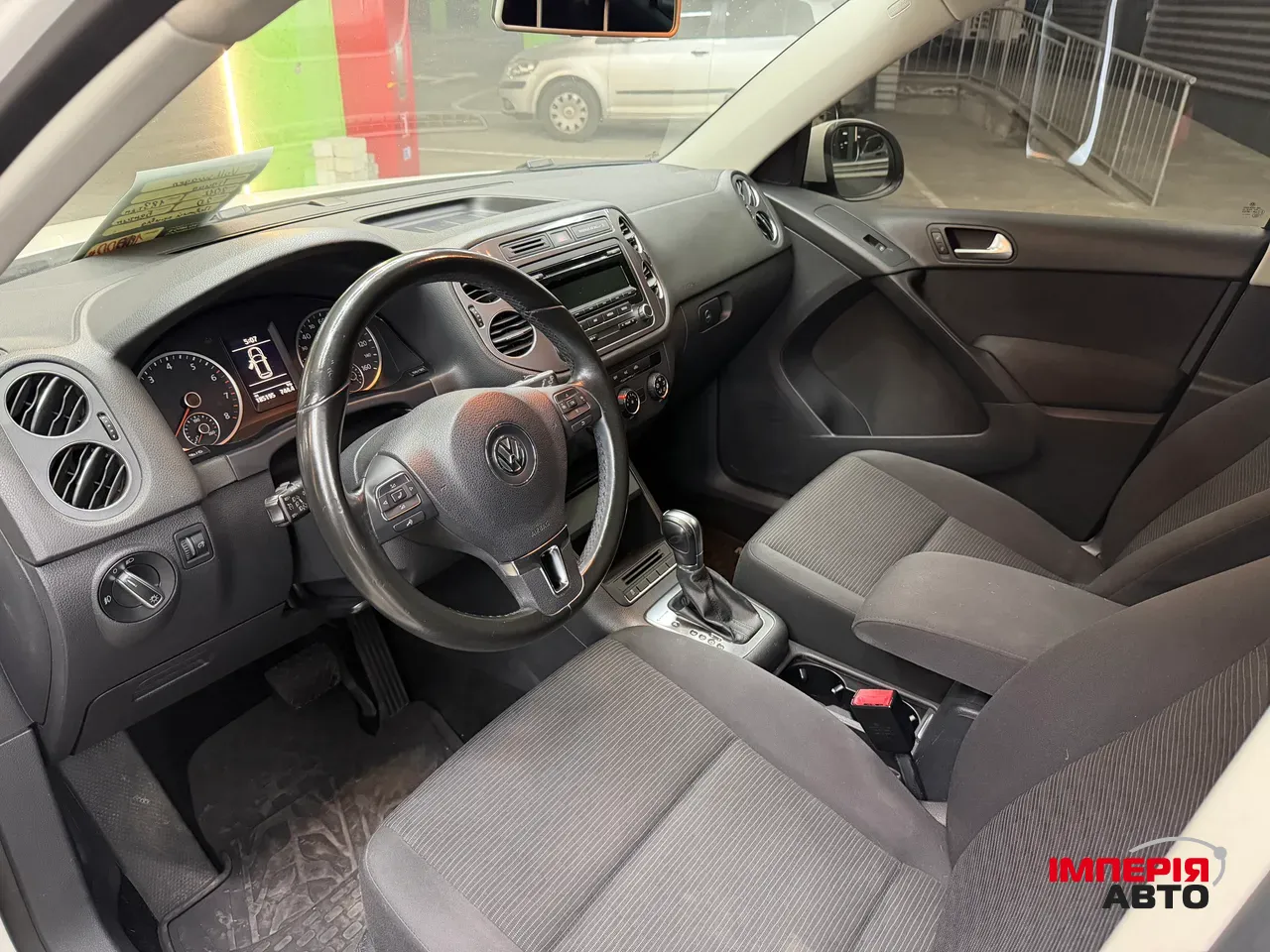 Volkswagen Tiguan - фото 8