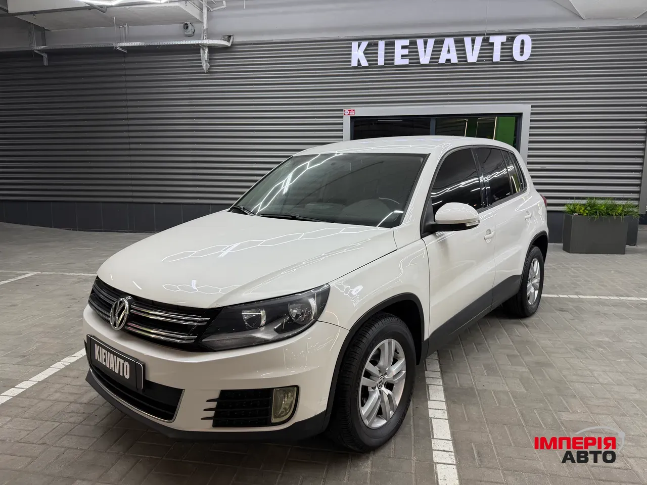 Volkswagen Tiguan - фото 1