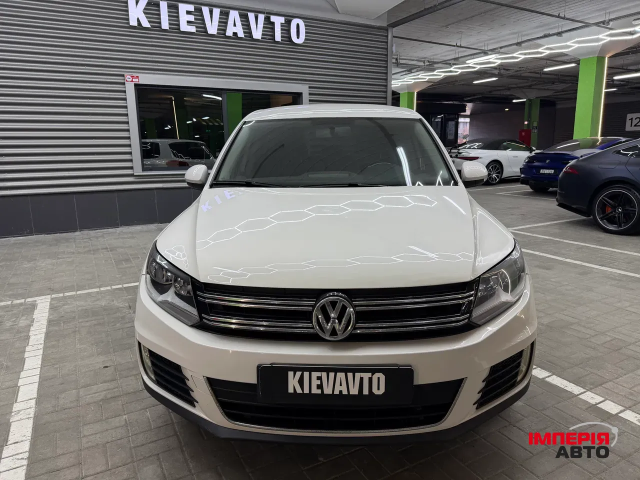 Volkswagen Tiguan - фото 2