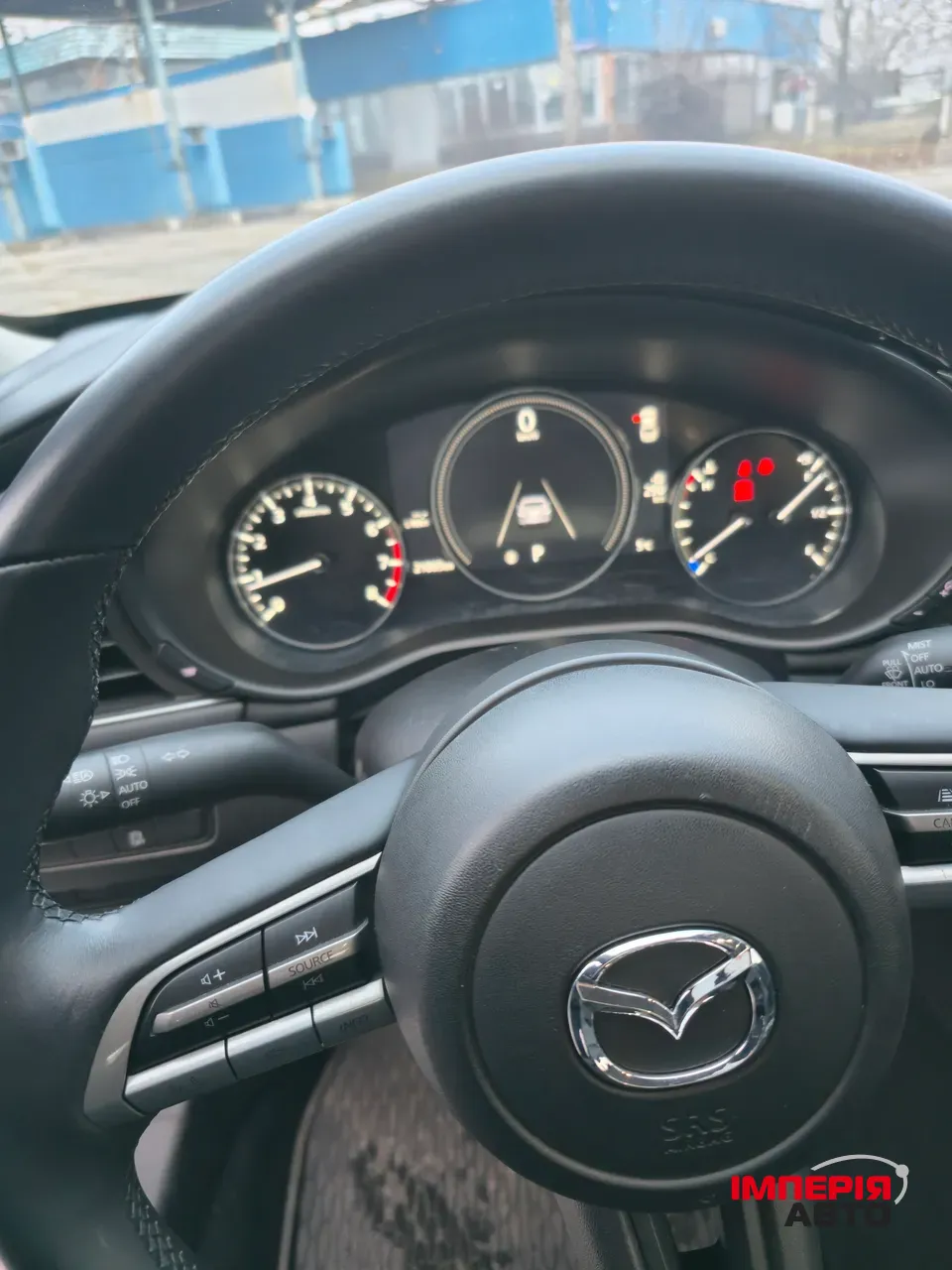 Mazda 3 - фото 8