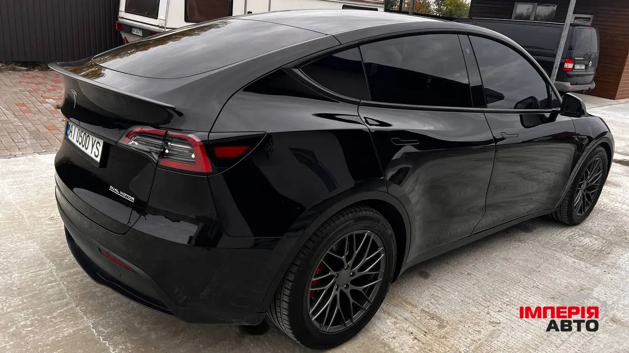 Tesla Model Y - фото 11