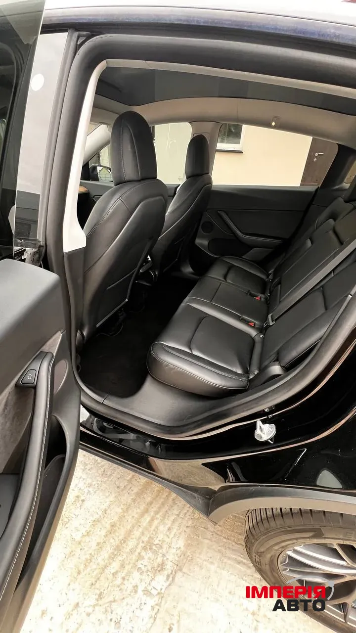 Tesla Model Y - фото 18