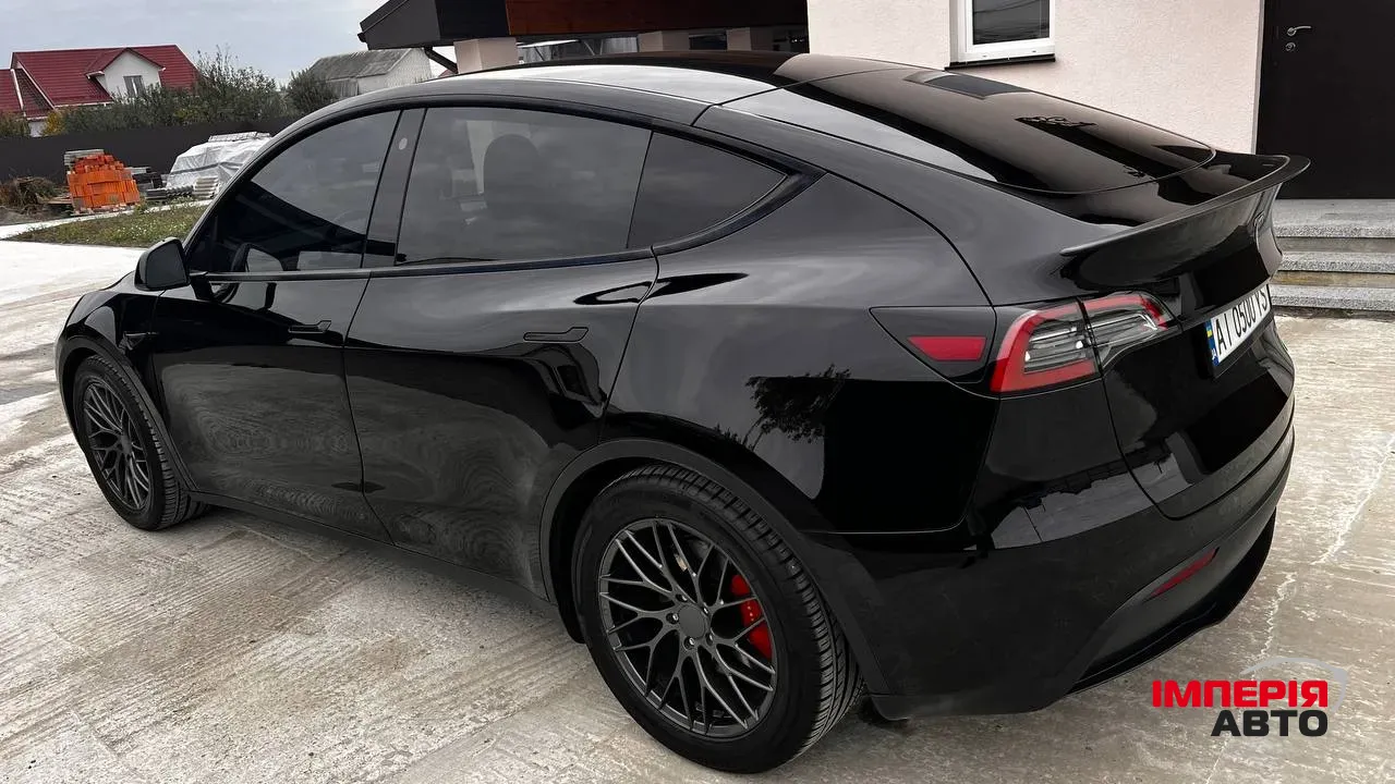 Tesla Model Y - фото 8