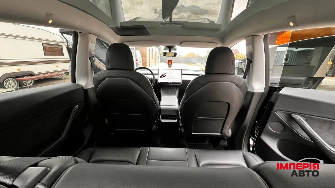 Tesla Model Y - фото 12