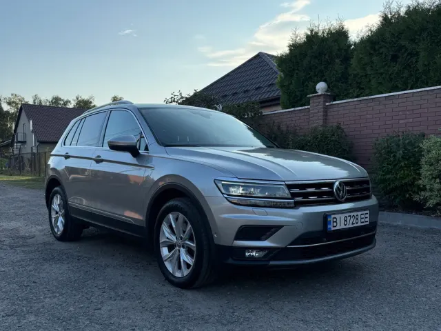 Volkswagen Tiguan - фото 1