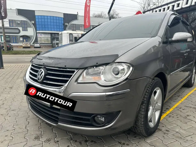 Volkswagen Touran - фото 2