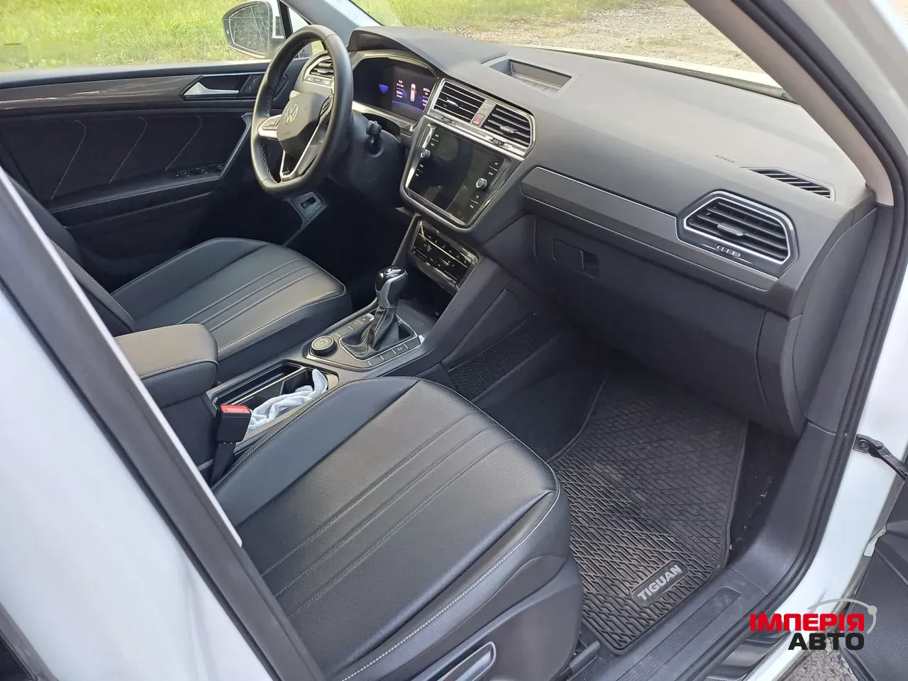 Volkswagen Tiguan - фото 11