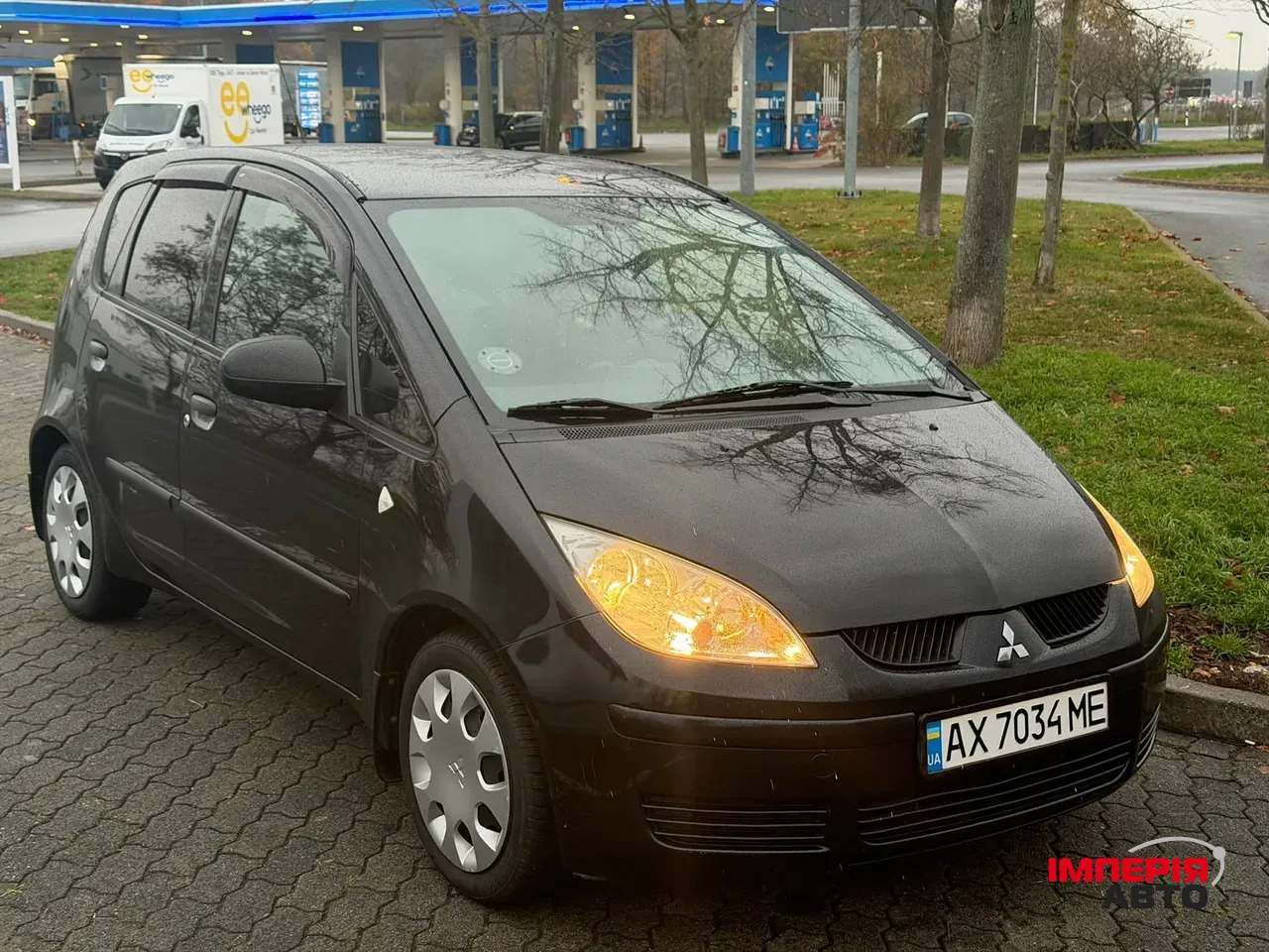 Mitsubishi Colt - фото 7