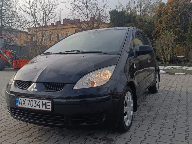 Mitsubishi Colt - фото 1
