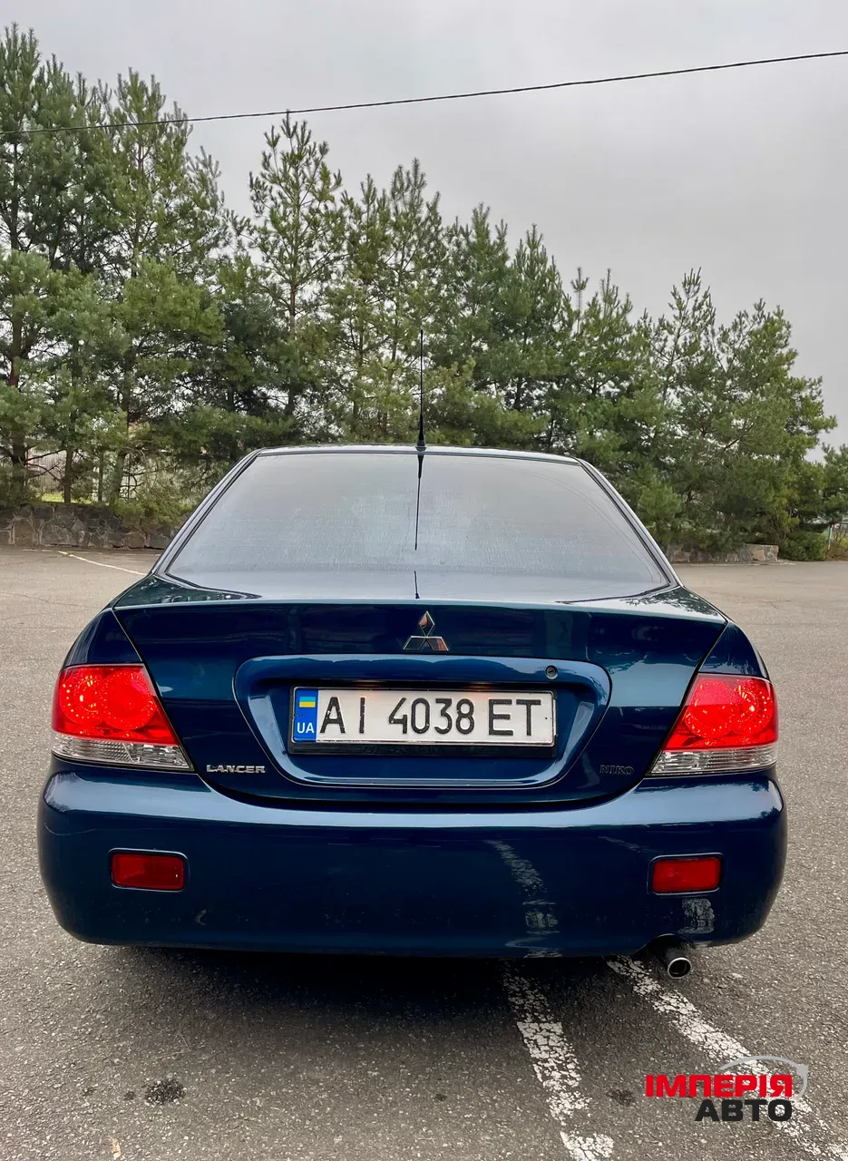 Mitsubishi Lancer - фото 7