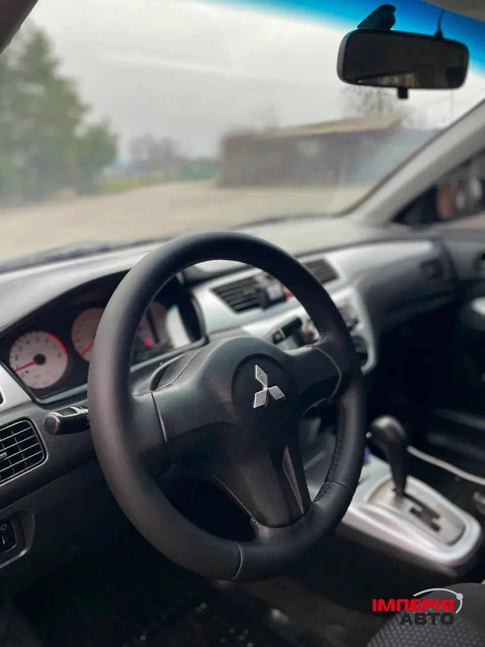 Mitsubishi Lancer - фото 17