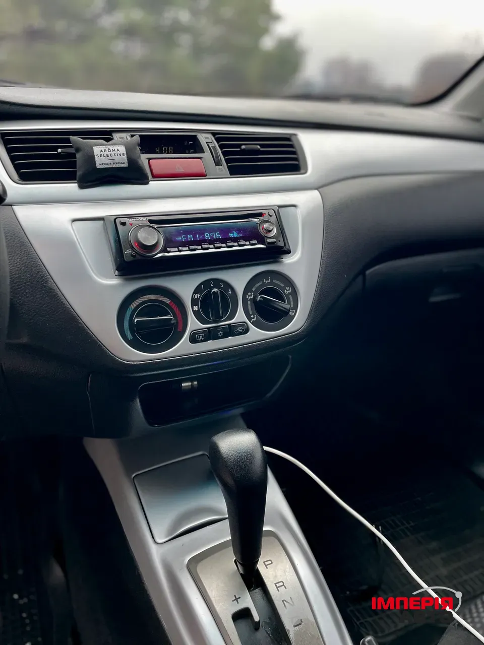 Mitsubishi Lancer - фото 18