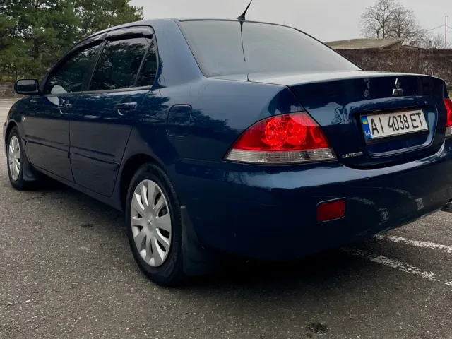 Mitsubishi Lancer - фото 5