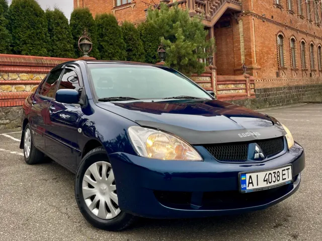 Mitsubishi Lancer - фото 1