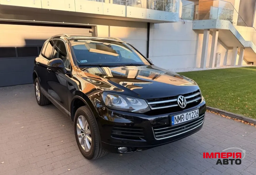 Volkswagen Touareg - фото 1