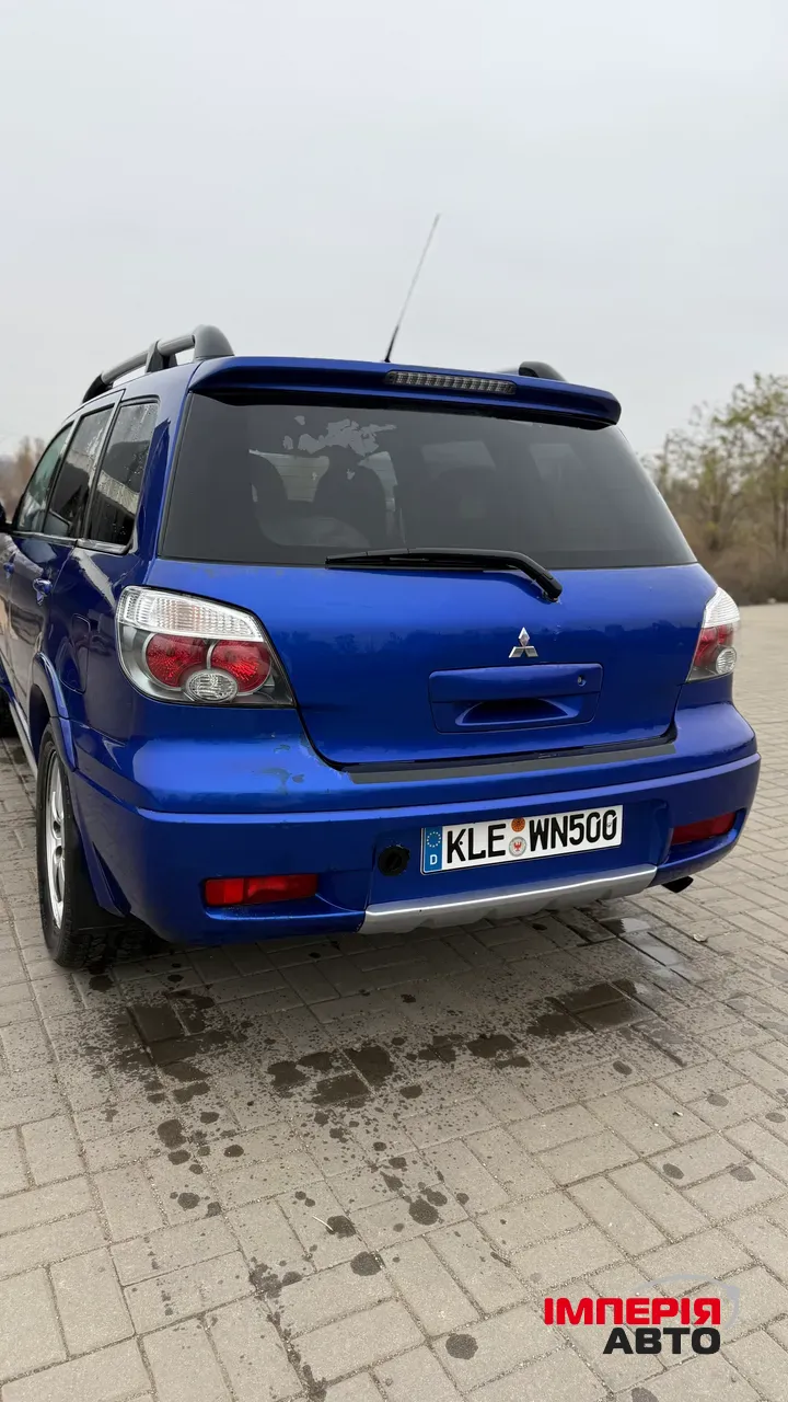 Mitsubishi Outlander - фото 16