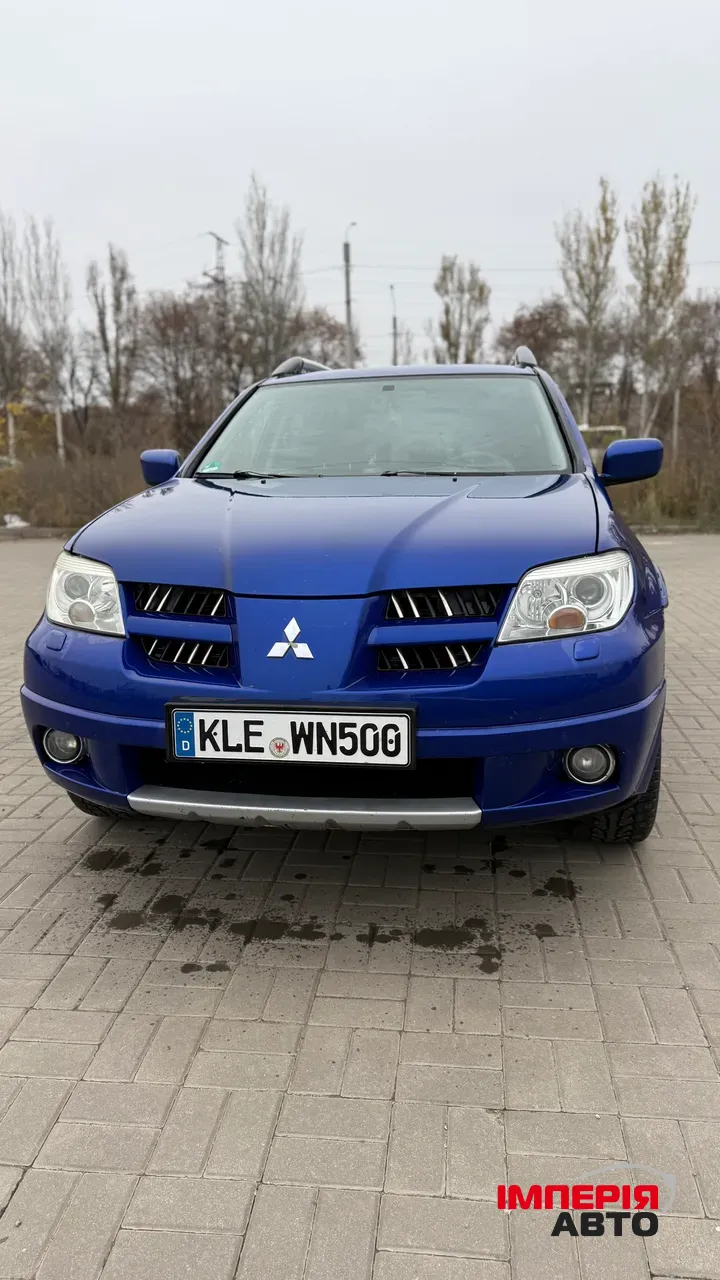 Mitsubishi Outlander - фото 4