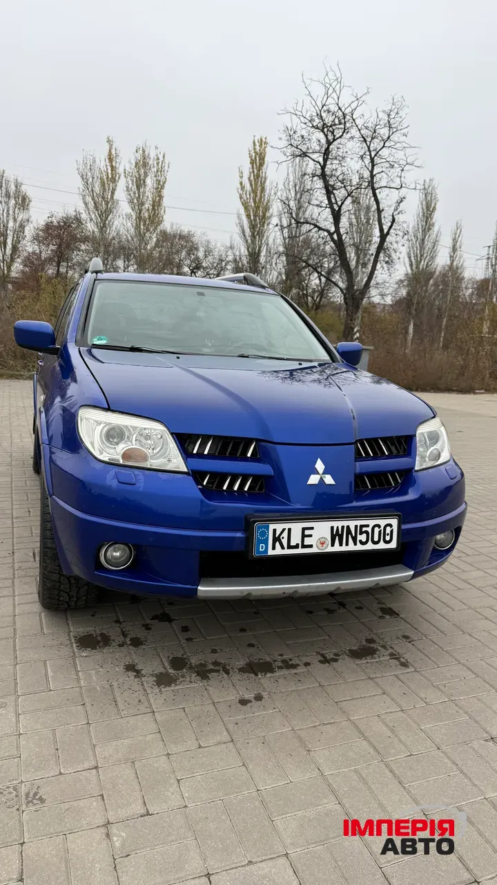 Mitsubishi Outlander - фото 2