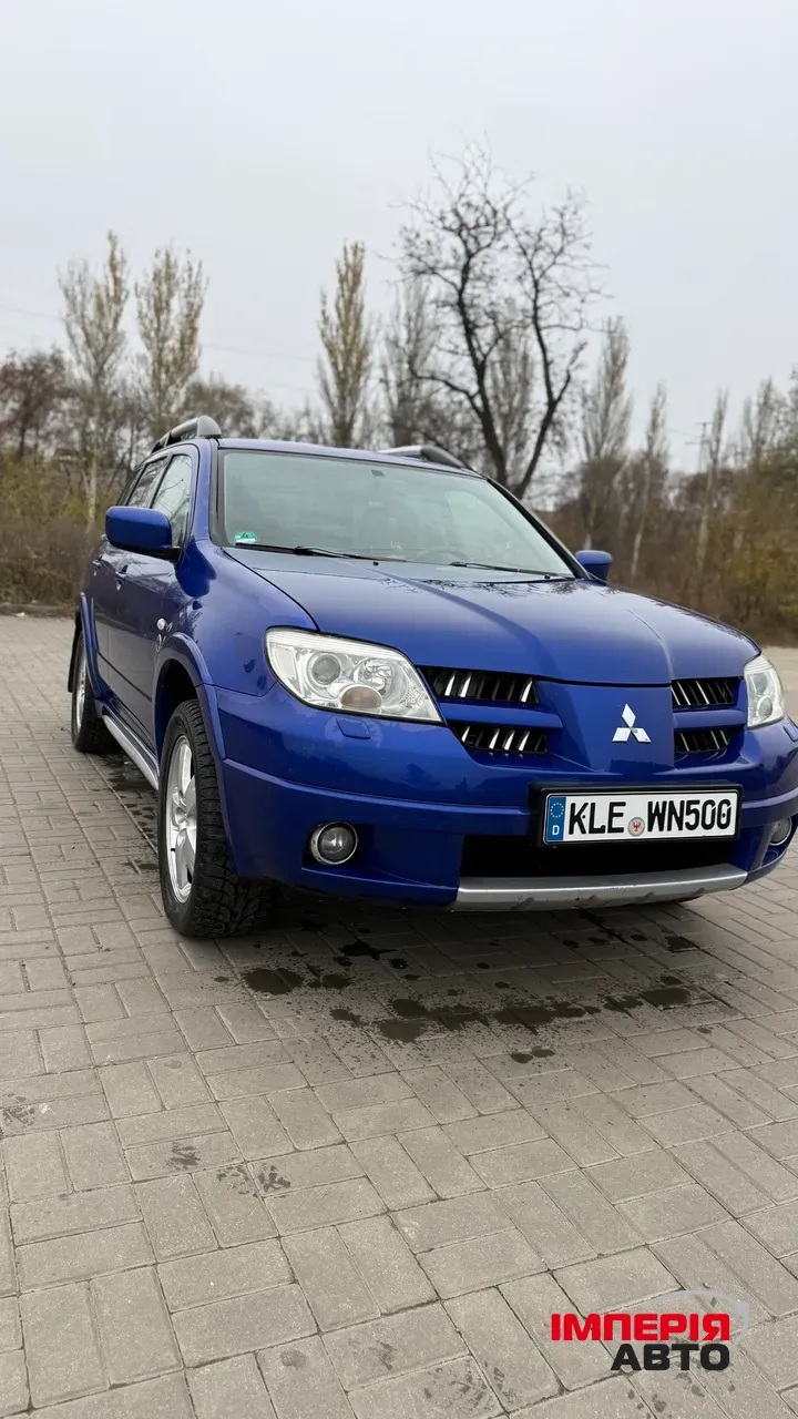 Mitsubishi Outlander - фото 5