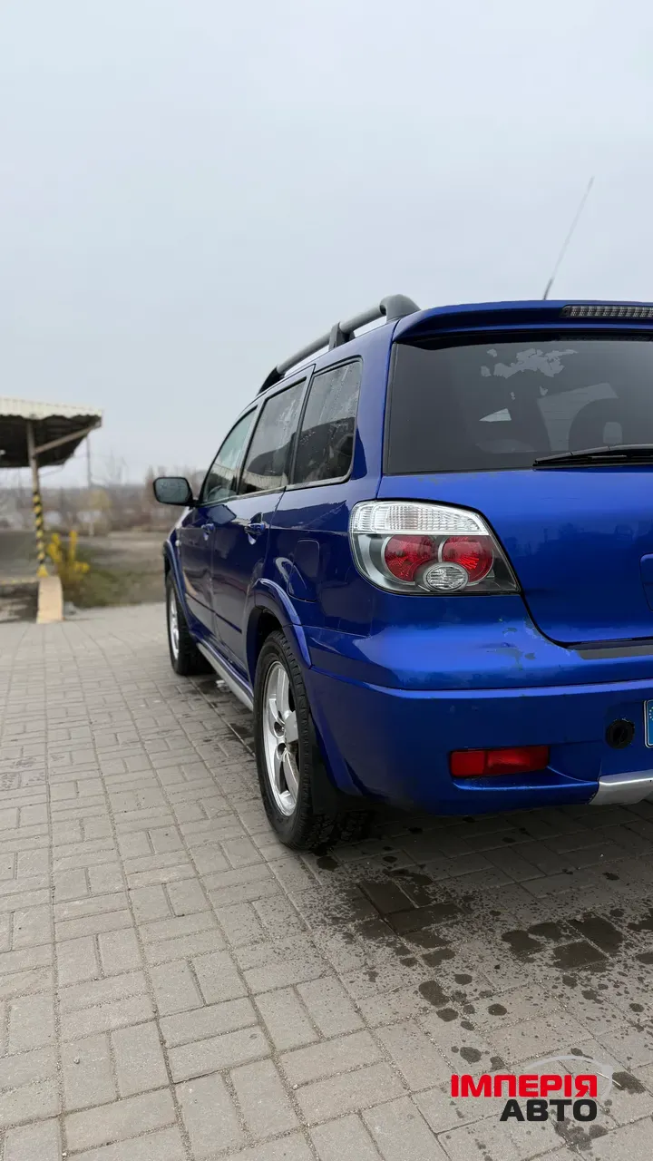 Mitsubishi Outlander - фото 13