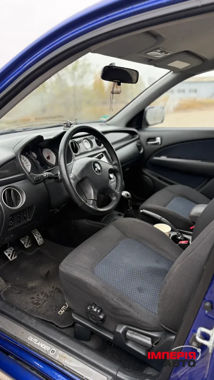 Mitsubishi Outlander - фото 20
