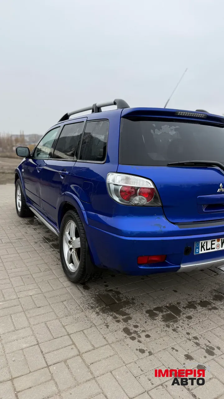 Mitsubishi Outlander - фото 14