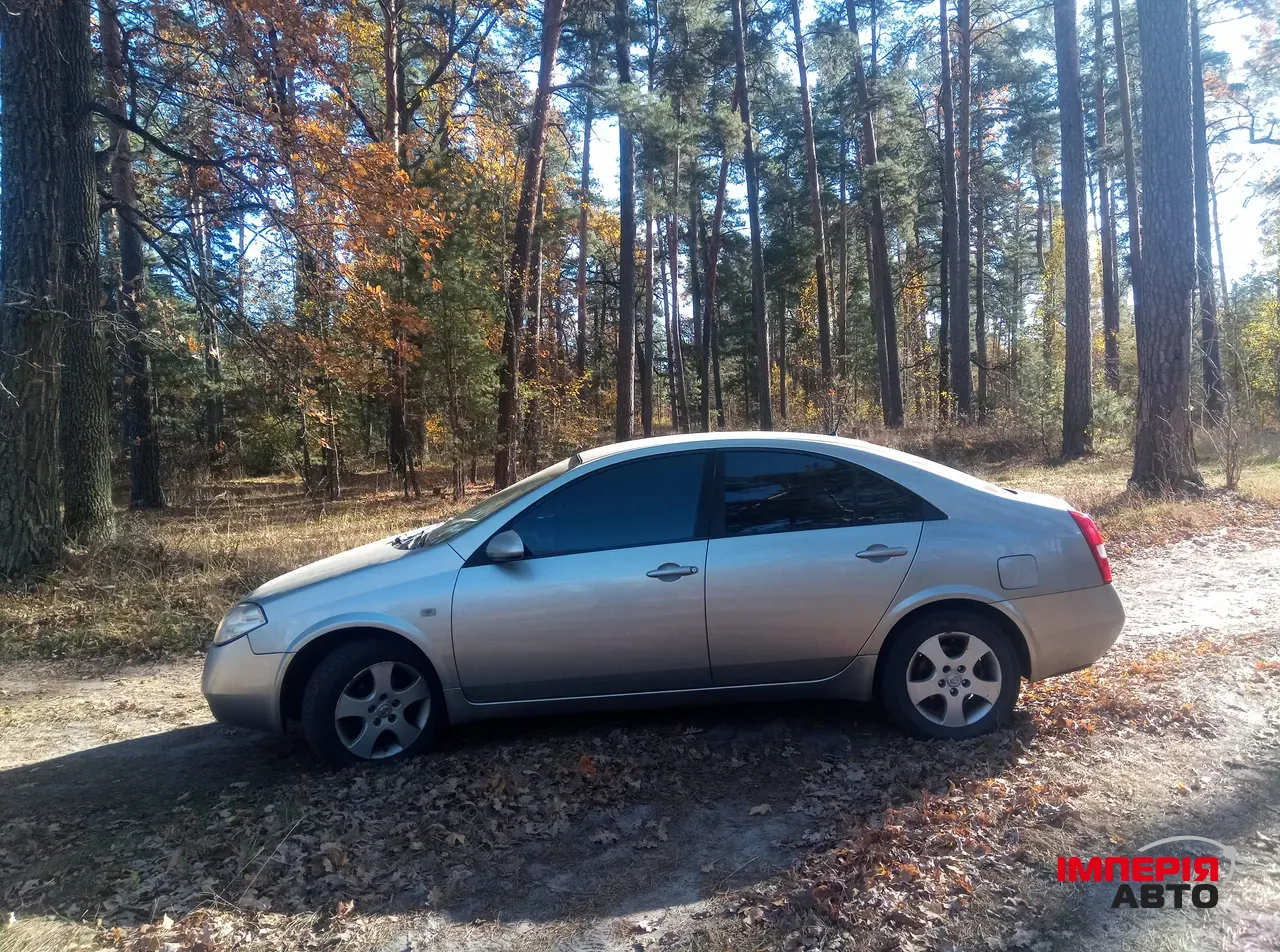 Nissan Primera - фото 4